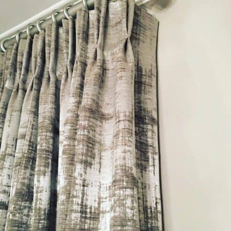 silver textured velvet curtain with silver curtain pole