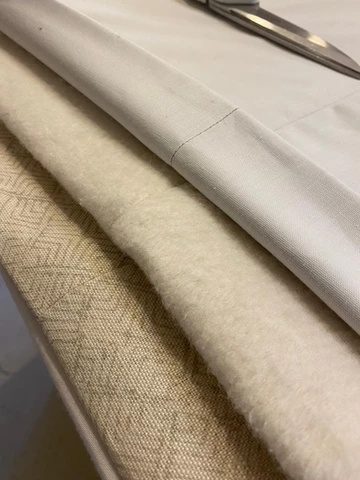 Neutral curtain lining material