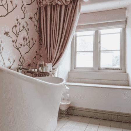 Baby pink curtains in bathroom