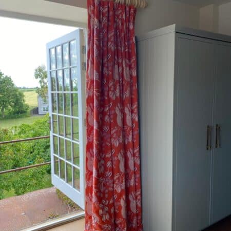 orange curtains with white floral pattern