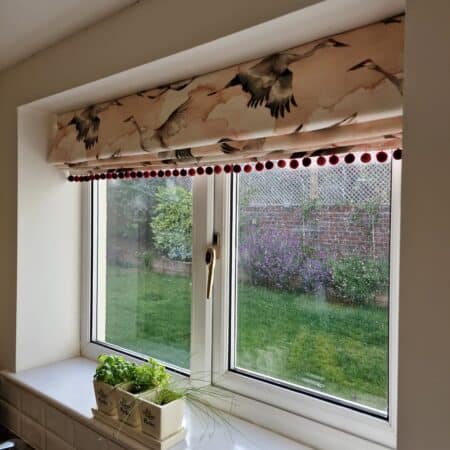 Blind with birds on with pom pom trim made by the boys that sew